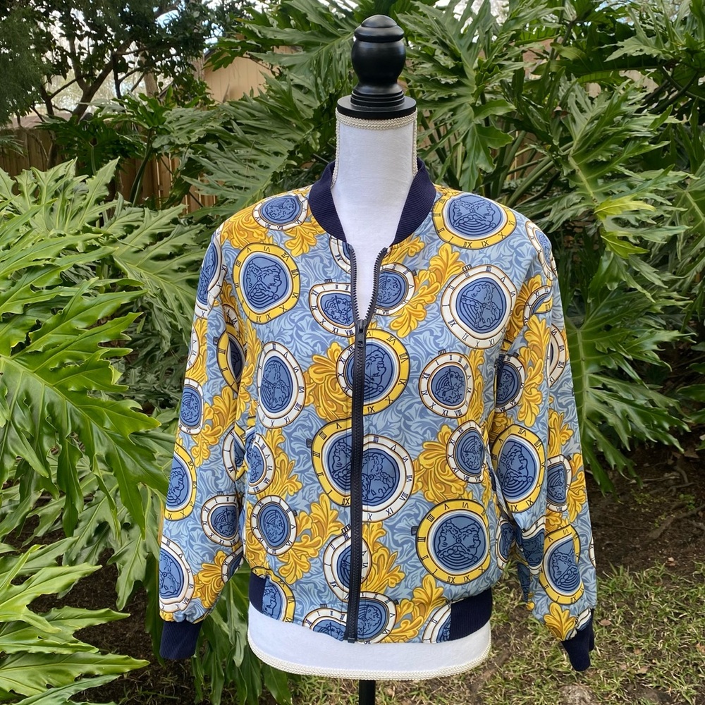 Vintage Notions medallion clock head bomber jacket. Versace vibes to the one.